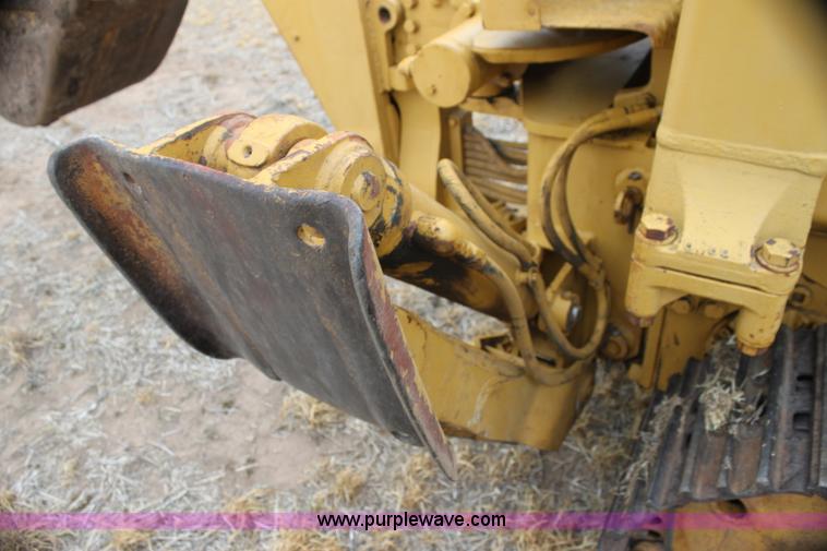 image for item H2112 1979 Caterpillar 931 track loader with backhoe attachment