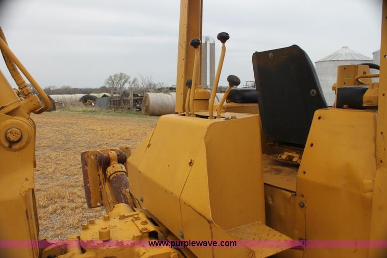 image for item H2112 1979 Caterpillar 931 track loader with backhoe attachment