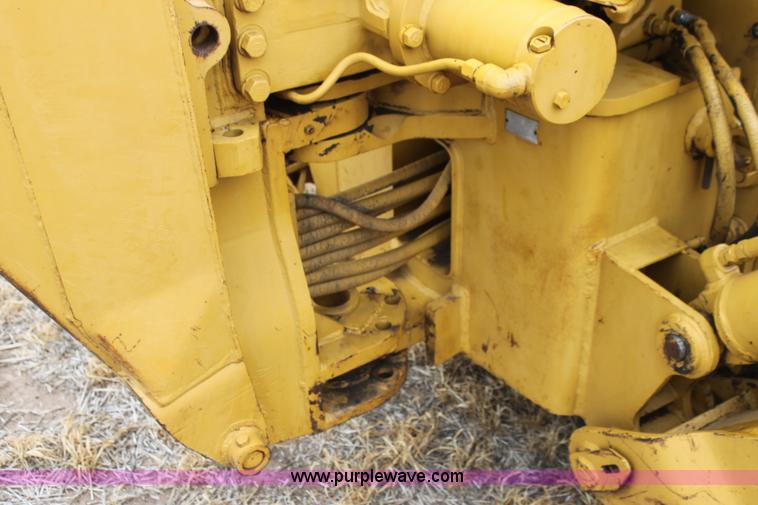 image for item H2112 1979 Caterpillar 931 track loader with backhoe attachment