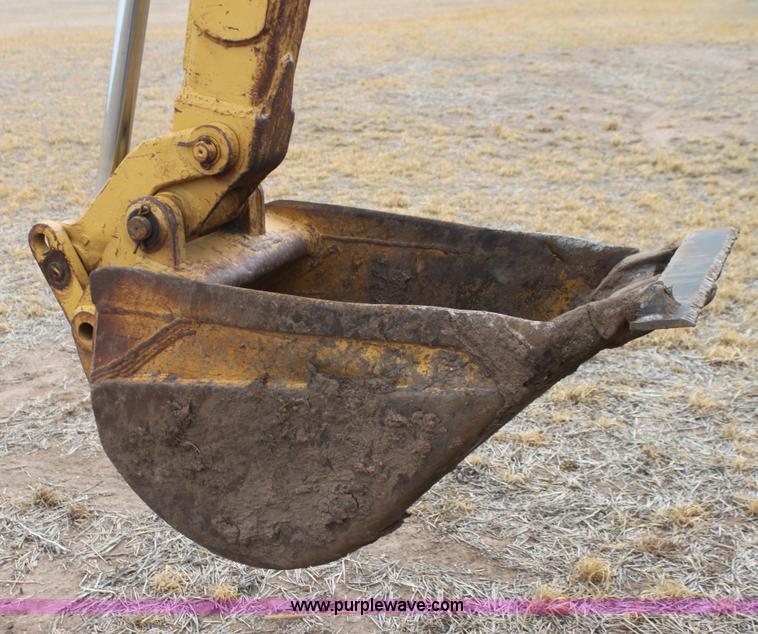 image for item H2112 1979 Caterpillar 931 track loader with backhoe attachment