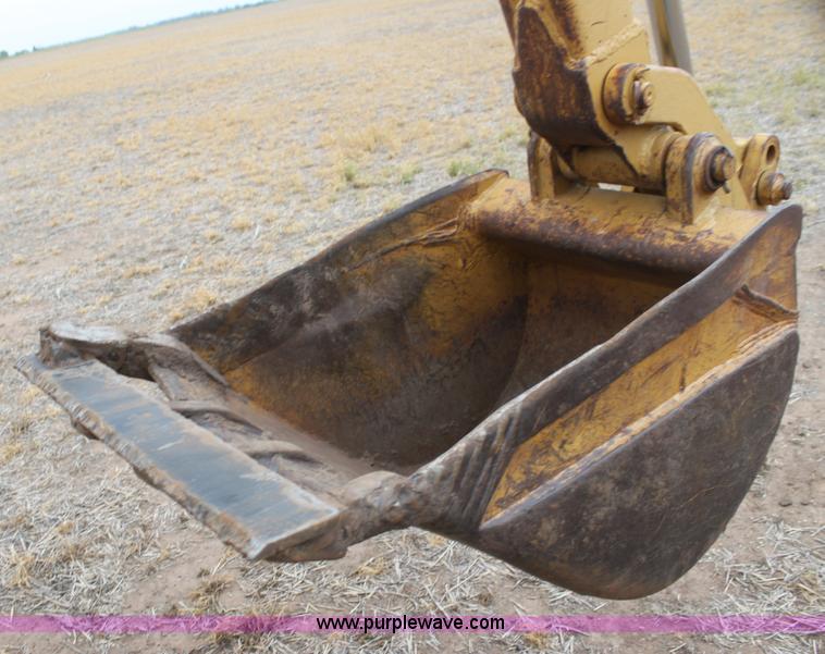 image for item H2112 1979 Caterpillar 931 track loader with backhoe attachment