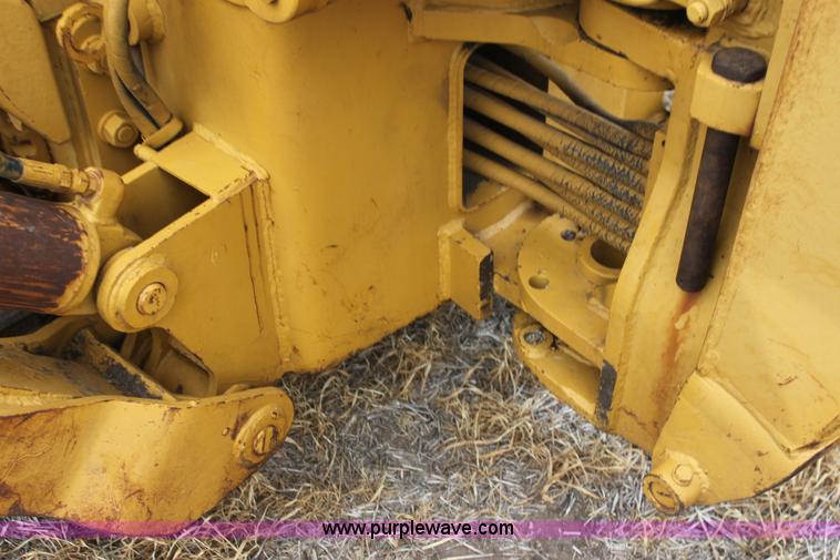 image for item H2112 1979 Caterpillar 931 track loader with backhoe attachment