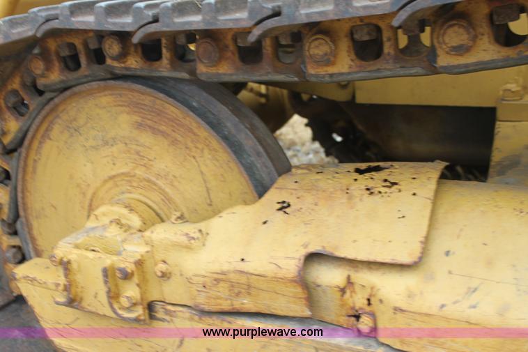 image for item H2112 1979 Caterpillar 931 track loader with backhoe attachment