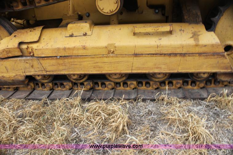 image for item H2112 1979 Caterpillar 931 track loader with backhoe attachment