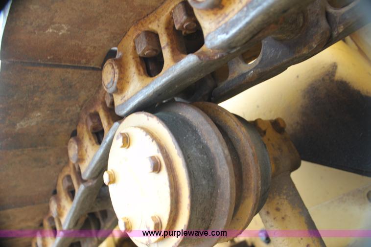 image for item H2112 1979 Caterpillar 931 track loader with backhoe attachment