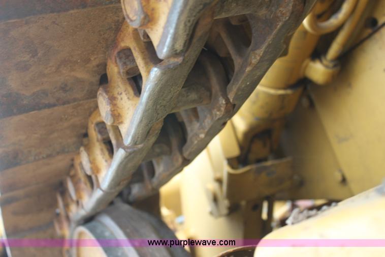 image for item H2112 1979 Caterpillar 931 track loader with backhoe attachment