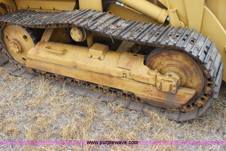 image for item H2112 1979 Caterpillar 931 track loader with backhoe attachment