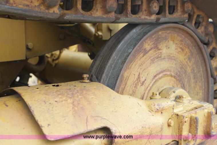 image for item H2112 1979 Caterpillar 931 track loader with backhoe attachment