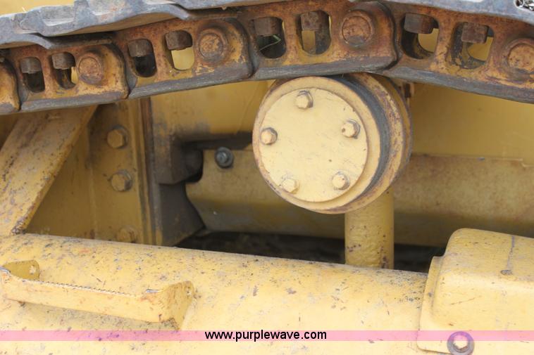 image for item H2112 1979 Caterpillar 931 track loader with backhoe attachment