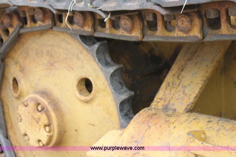 image for item H2112 1979 Caterpillar 931 track loader with backhoe attachment