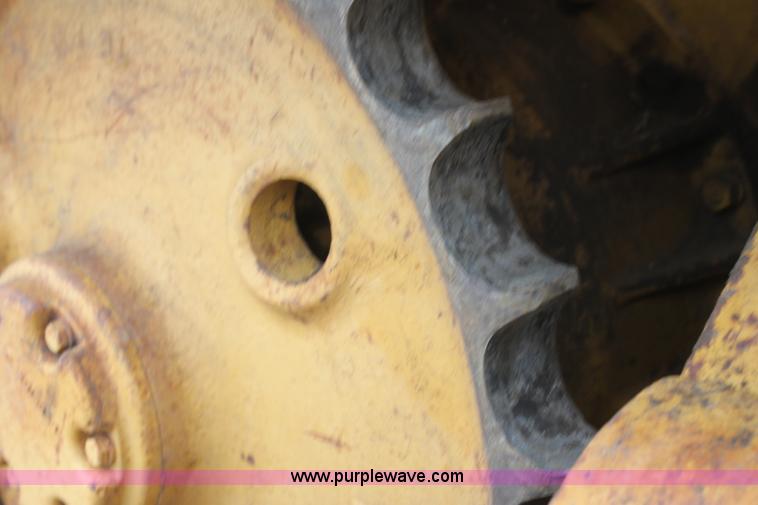 image for item H2112 1979 Caterpillar 931 track loader with backhoe attachment