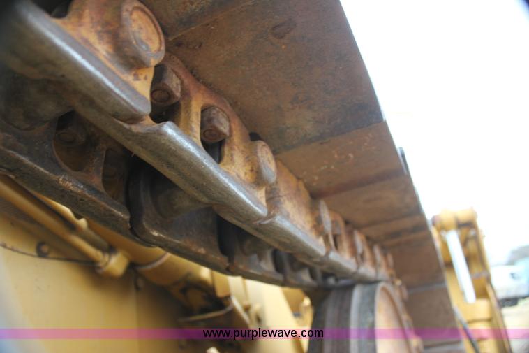 image for item H2112 1979 Caterpillar 931 track loader with backhoe attachment