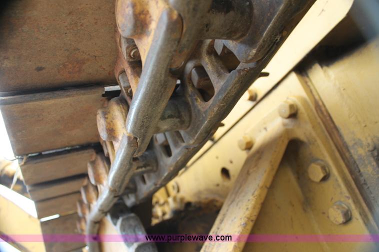 image for item H2112 1979 Caterpillar 931 track loader with backhoe attachment