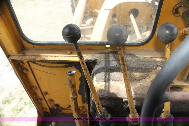 image for item H2113 Caterpillar 12 motor grader