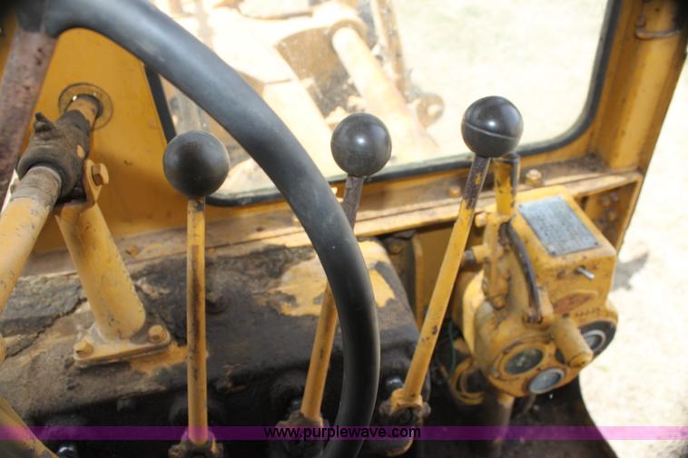 image for item H2113 Caterpillar 12 motor grader