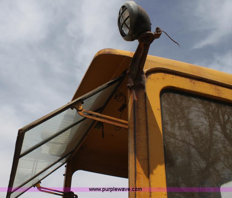 image for item H2113 Caterpillar 12 motor grader