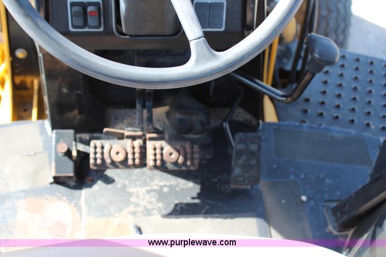 image for item H2598 1997 John Deere 310E backhoe