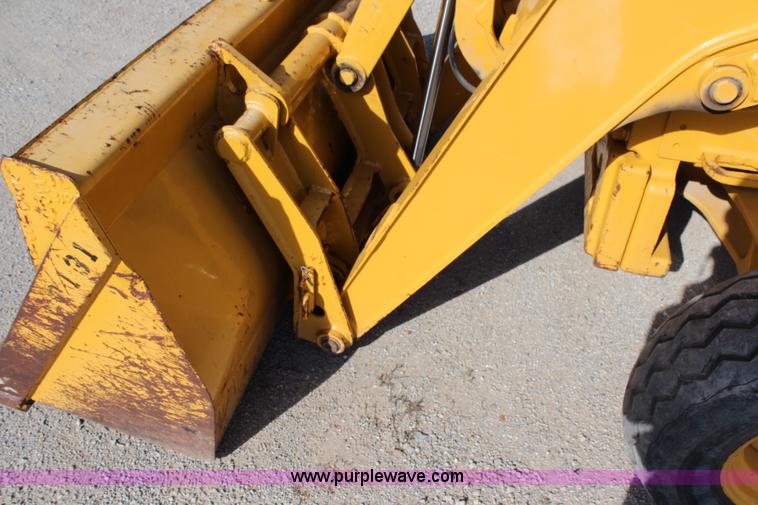 image for item H2598 1997 John Deere 310E backhoe
