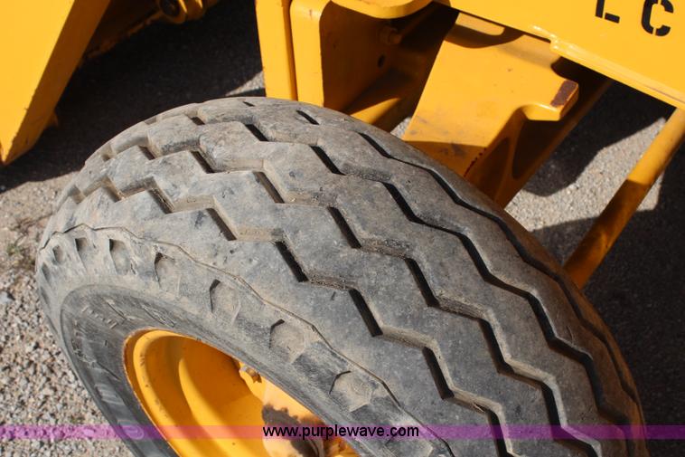 image for item H2598 1997 John Deere 310E backhoe