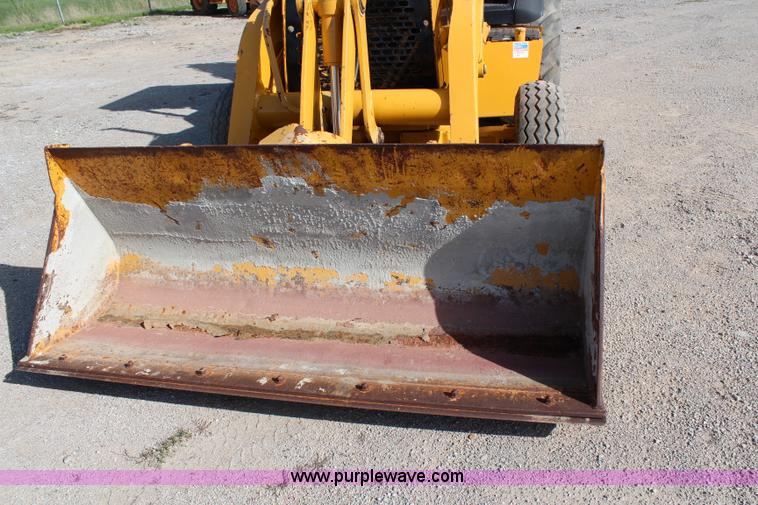 image for item H2598 1997 John Deere 310E backhoe