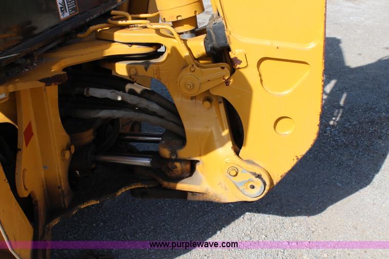 image for item H2598 1997 John Deere 310E backhoe