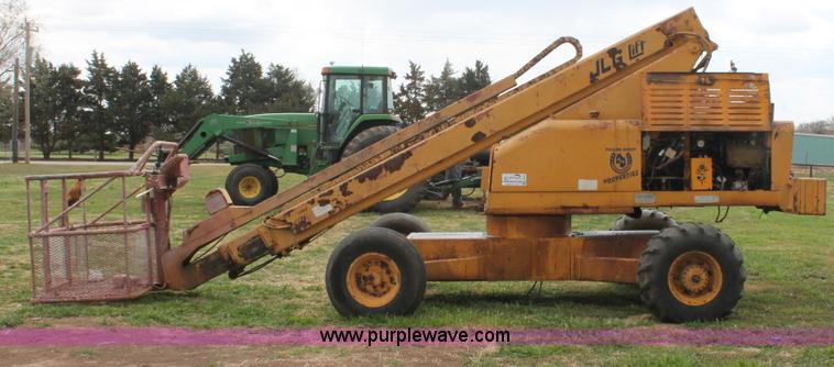 image for item H5724 1979 JLG 40F telescopic boom lift