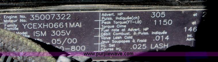 image for item H6004 2001 Volvo WG64 flatbed truck with Terex boom