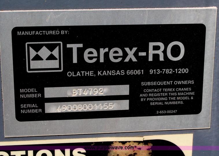 image for item H6004 2001 Volvo WG64 flatbed truck with Terex boom