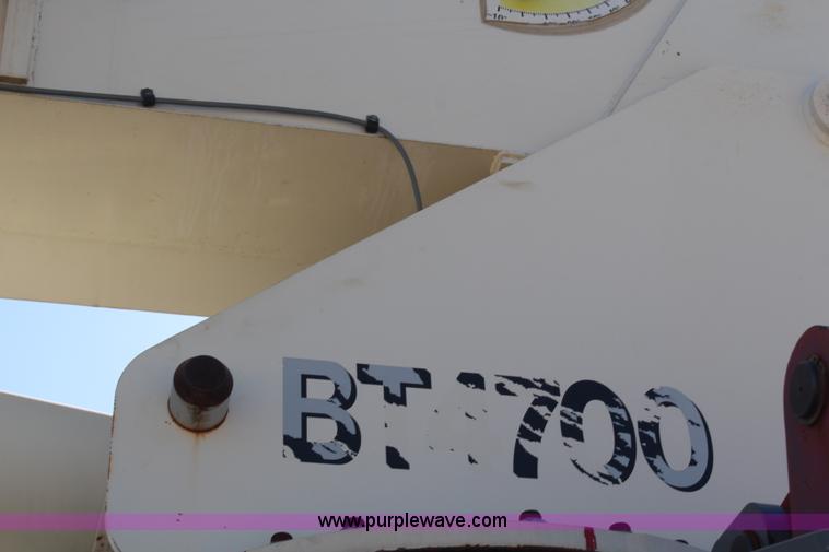 image for item H6004 2001 Volvo WG64 flatbed truck with Terex boom