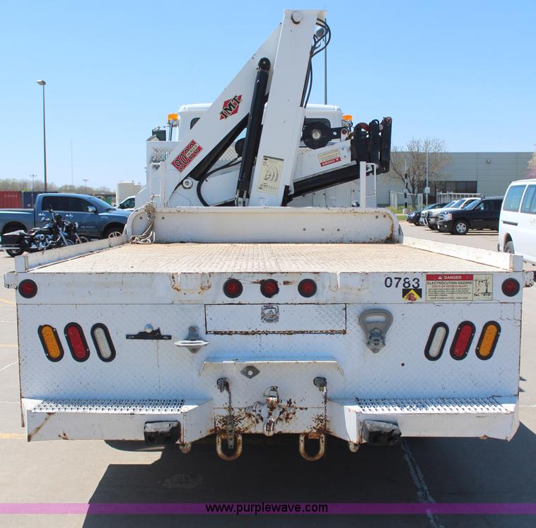 image for item H6088 2003 Freightliner FL80 flatbed truck with knuckle boom crane