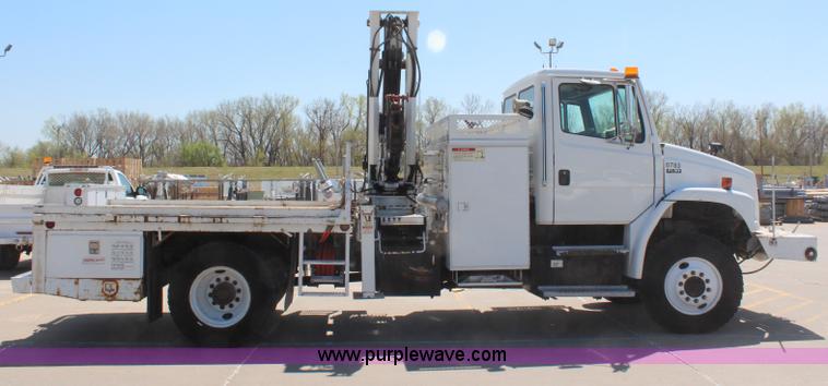 image for item H6088 2003 Freightliner FL80 flatbed truck with knuckle boom crane