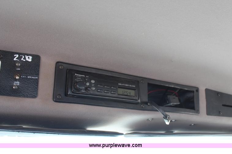 image for item H6088 2003 Freightliner FL80 flatbed truck with knuckle boom crane