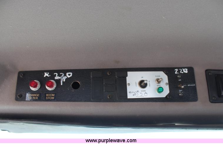 image for item H6088 2003 Freightliner FL80 flatbed truck with knuckle boom crane