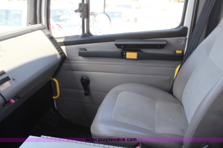 image for item H6088 2003 Freightliner FL80 flatbed truck with knuckle boom crane