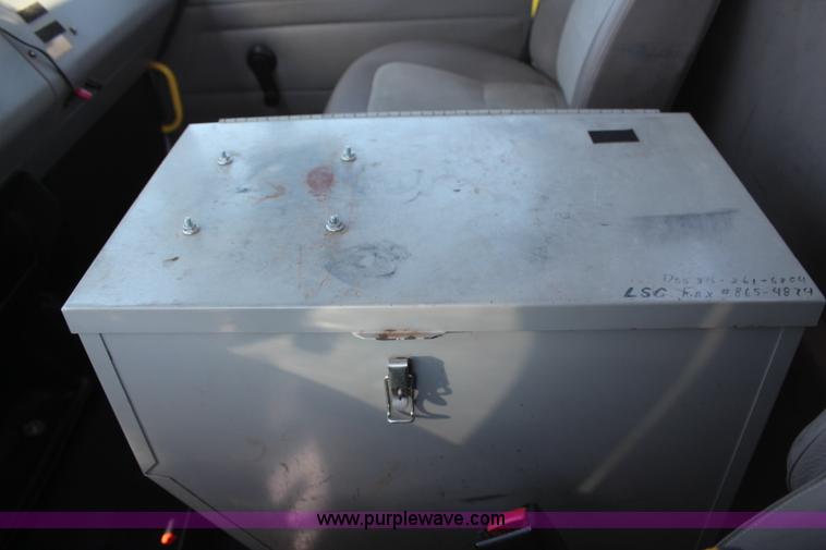 image for item H6088 2003 Freightliner FL80 flatbed truck with knuckle boom crane