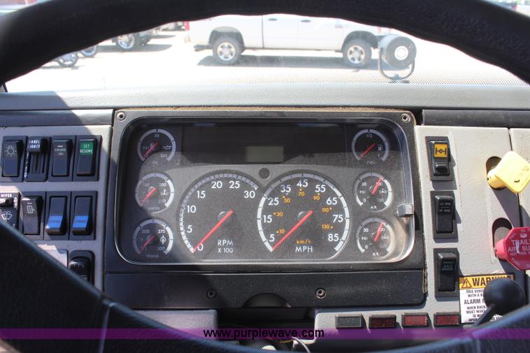 image for item H6088 2003 Freightliner FL80 flatbed truck with knuckle boom crane