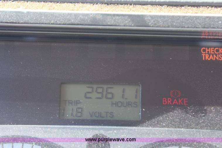 image for item H6088 2003 Freightliner FL80 flatbed truck with knuckle boom crane