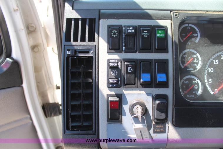 image for item H6088 2003 Freightliner FL80 flatbed truck with knuckle boom crane