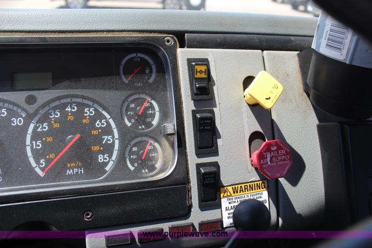 image for item H6088 2003 Freightliner FL80 flatbed truck with knuckle boom crane