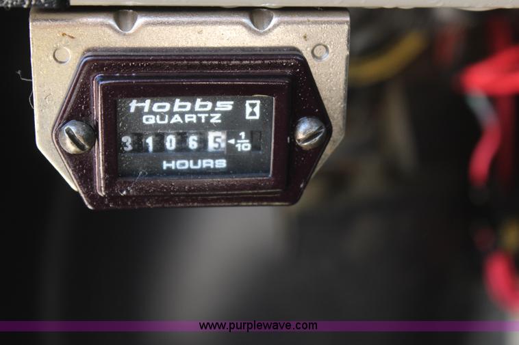 image for item H6088 2003 Freightliner FL80 flatbed truck with knuckle boom crane