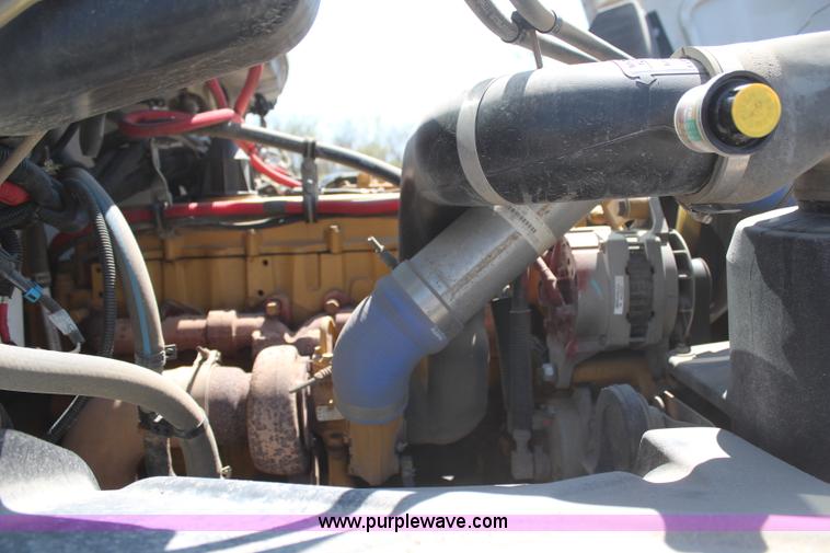 image for item H6088 2003 Freightliner FL80 flatbed truck with knuckle boom crane