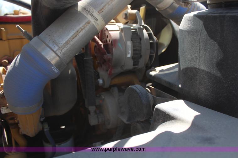 image for item H6088 2003 Freightliner FL80 flatbed truck with knuckle boom crane