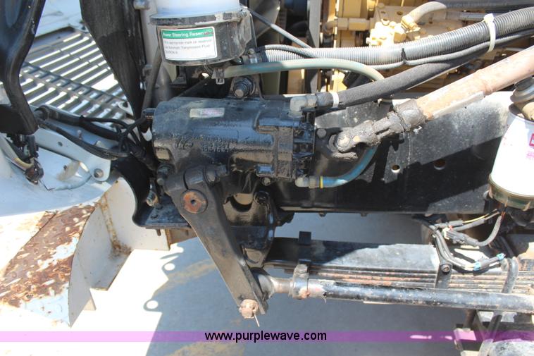 image for item H6088 2003 Freightliner FL80 flatbed truck with knuckle boom crane