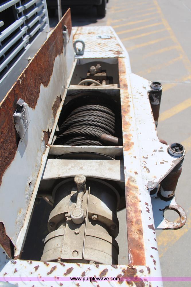 image for item H6088 2003 Freightliner FL80 flatbed truck with knuckle boom crane