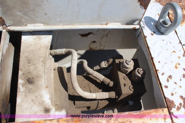 image for item H6088 2003 Freightliner FL80 flatbed truck with knuckle boom crane