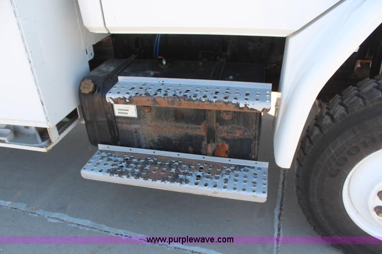 image for item H6088 2003 Freightliner FL80 flatbed truck with knuckle boom crane