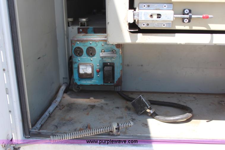 image for item H6088 2003 Freightliner FL80 flatbed truck with knuckle boom crane