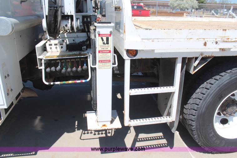 image for item H6088 2003 Freightliner FL80 flatbed truck with knuckle boom crane