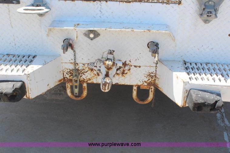 image for item H6088 2003 Freightliner FL80 flatbed truck with knuckle boom crane