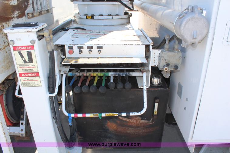 image for item H6088 2003 Freightliner FL80 flatbed truck with knuckle boom crane